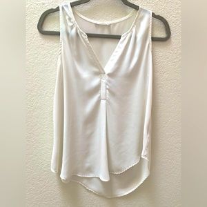New without Tags. LUSH white sleeveless blouse.